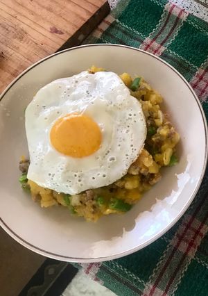 Una foto de Charquicán con huevo frito