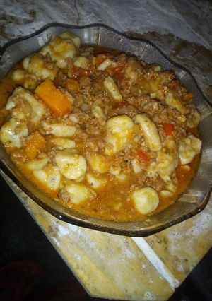 Una foto de Ñoquis de Papas al Tuco