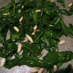 A picture of Buttered wilted baby spinach.