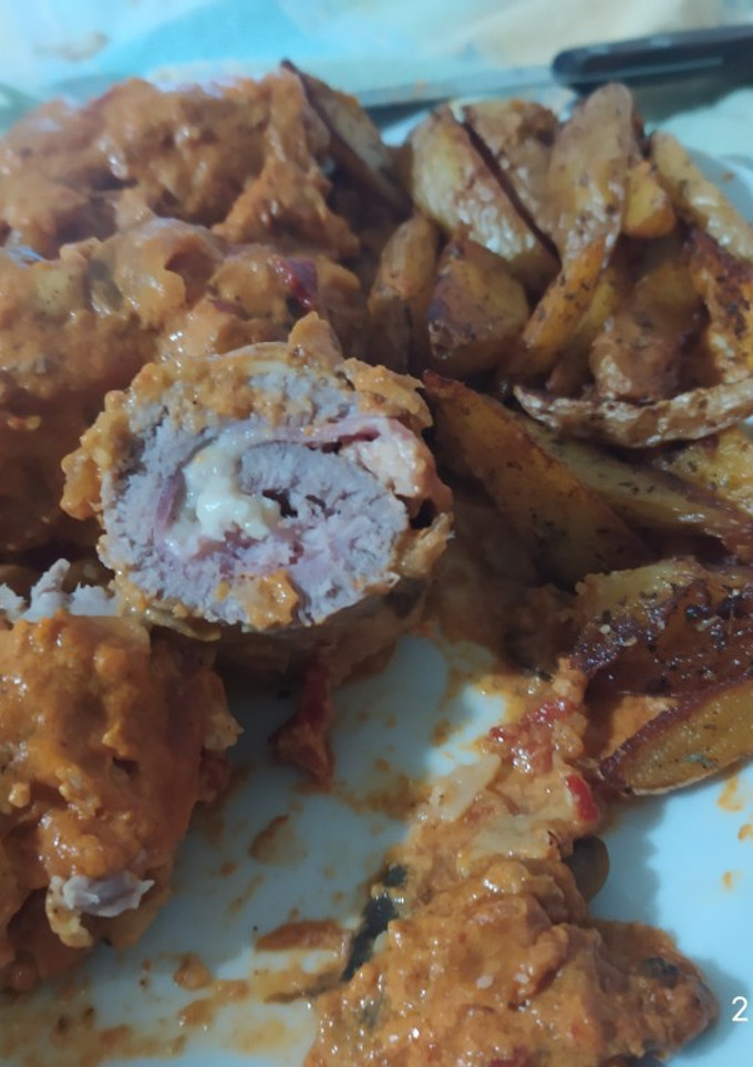 Una foto de Flamenquines de ternera con salsa de pimiento rojo