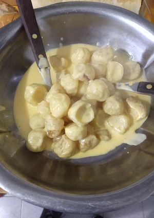 Una foto de Papas con cheddar