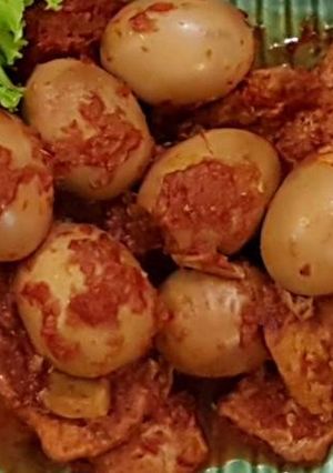 A picture of Spiced Egg And Tofu (Telur Tahu Bumbu Bali).