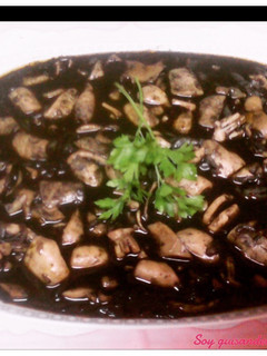 Una foto de Calamares en su tinta