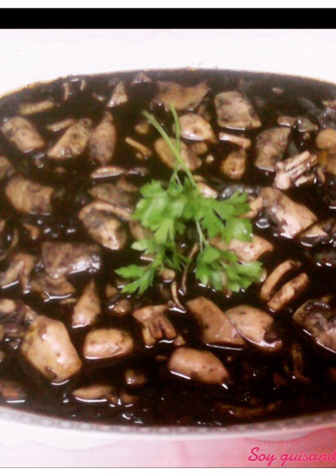 Una foto de Calamares en su tinta
