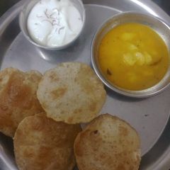 A picture of Aloo Sabji Puri.