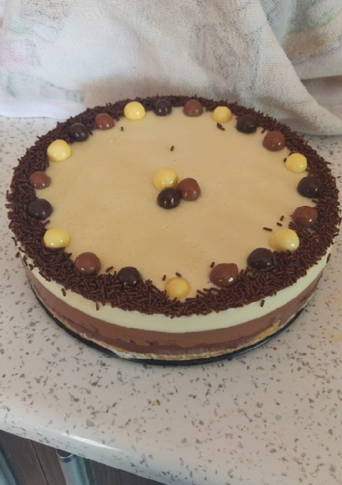 Una foto de Tarta tres chocolates TMX31