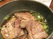 A picture of leeks in ramen