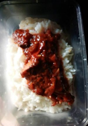 A picture of Rice with Fish sauce.