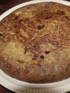 Una foto de Tortilla de alcachofas y cebolla