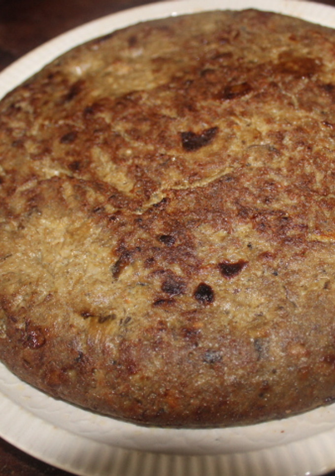 Una foto de Tortilla de alcachofas y cebolla