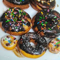A picture of Chocolate ganache donuts.