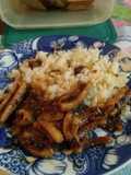 Calamar al vino blanco con arroz