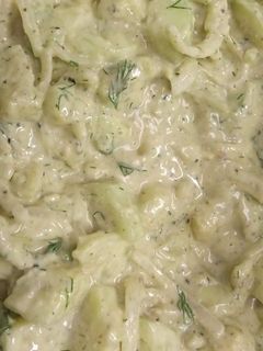 A picture of Cucumber salad with alkaline ranch dressing.