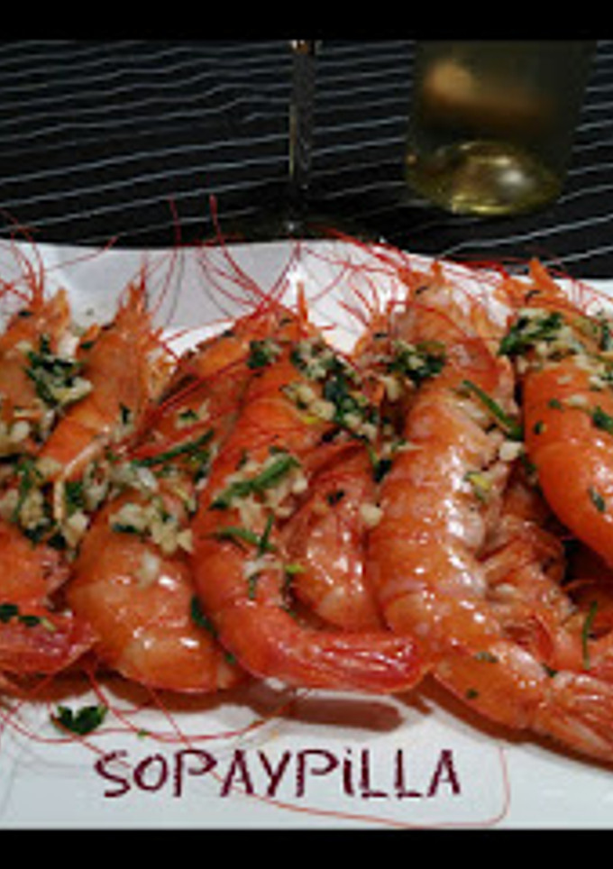Una foto de Gambones al horno al brandy