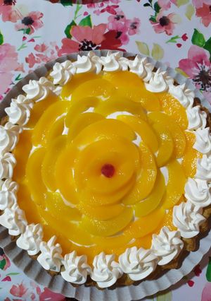Una foto de Tarta de durazno con crema