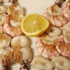 A picture of Seafood on a stick.