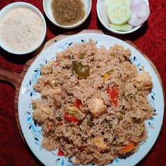 A picture of Brown Rice Pulao in Cooker.