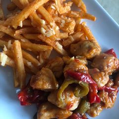 A picture of Sweet Chilli Chicken with Chilli Cheese Chips.