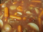 A picture of mushroom soup with beef broth