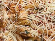 A picture of penne and spinach
