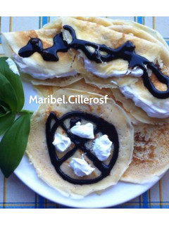 Una foto de Tortitas con nata y chocolate