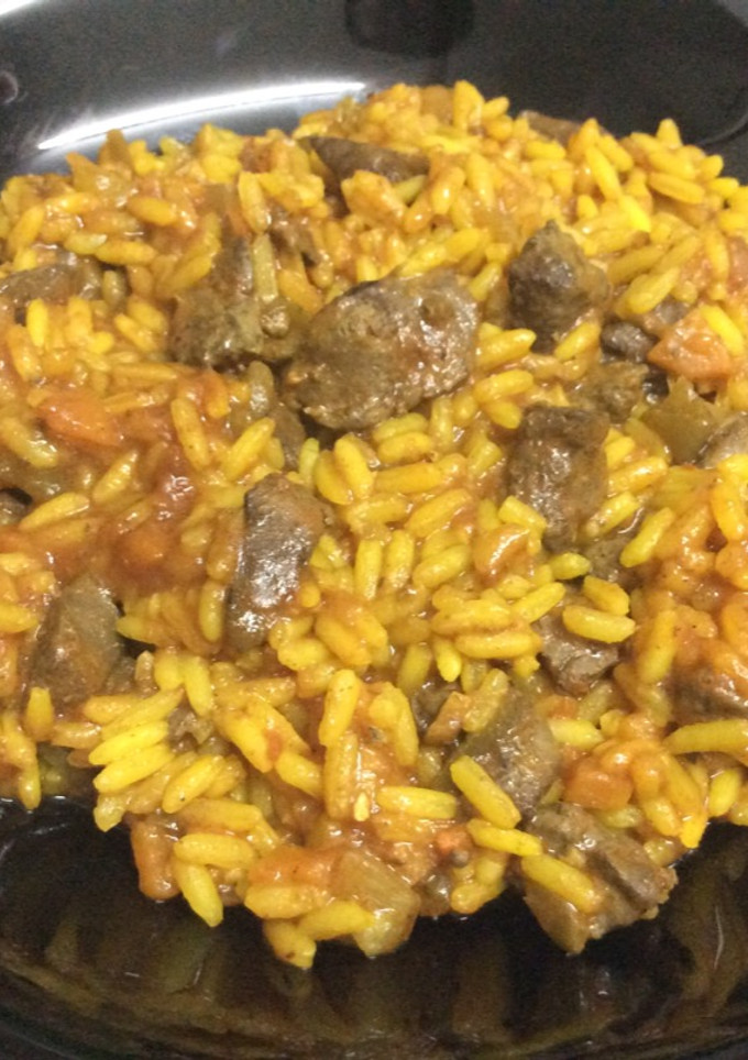 Una foto de Arroz con higaditos de pollo