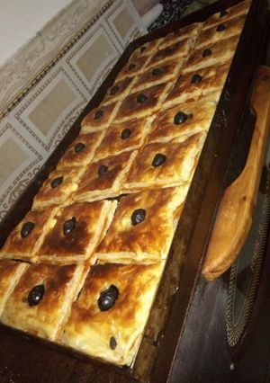 صورة لوصفة كوكا بالعجينة المورقة