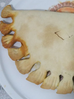Una foto de Calzone de atún y tomate