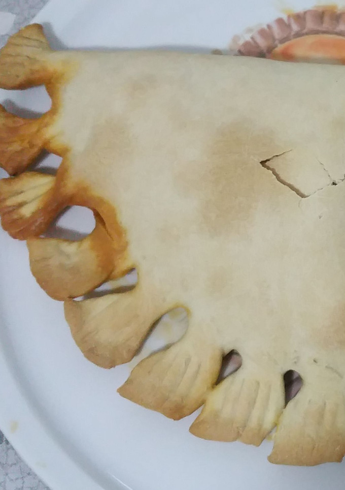 Una foto de Calzone de atún y tomate