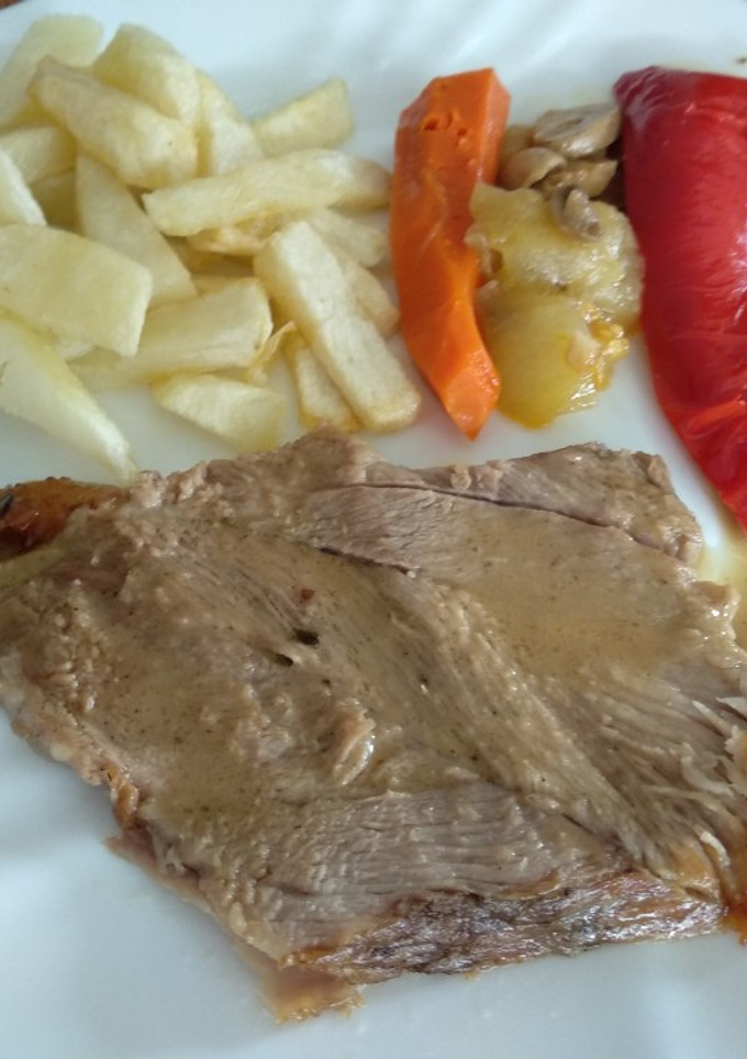 Una foto de Paleta de cerdo al horno