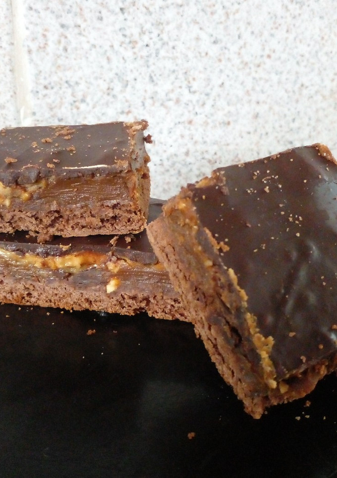 Una foto de 『 Torta bombón 🍫 tarta de dulce de leche y chocolate 』