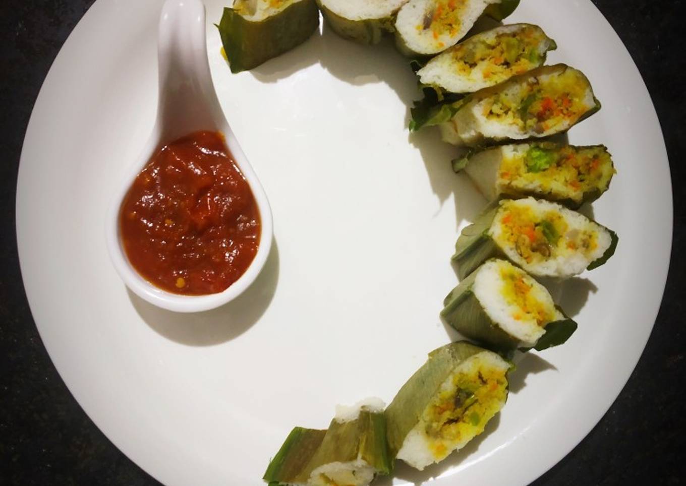 Sushi styled fish enduri pitha with Date tomato chilli Jam