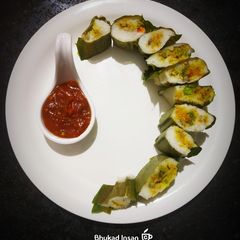 A picture of Sushi styled fish enduri pitha with Date tomato chilli Jam.