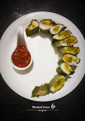 A picture of Sushi styled fish enduri pitha with Date tomato chilli Jam.