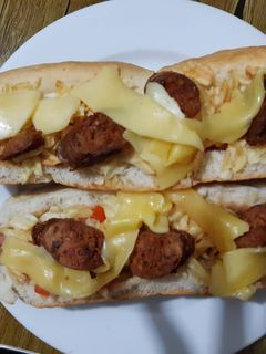 Una foto de As de longaniza