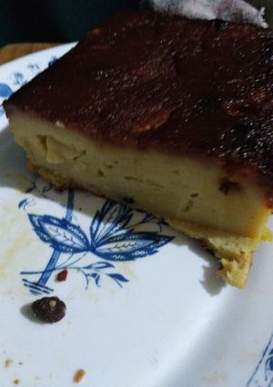 Una foto de Budín de pan con manzana y pasas de uva