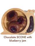 Chocolate scone with blueberry jam