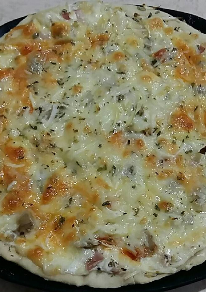 Una foto de Pizza carbonara
