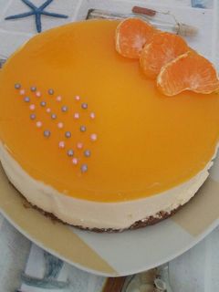 Una foto de Mousse de mandarina y gelatina de mandarina