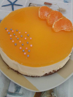 Una foto de Mousse de mandarina y gelatina de mandarina