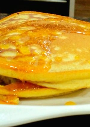 A picture of Pancakes with Caramel Syrup.