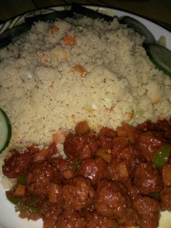 A picture of Stir fry couscous with meat balls stew.