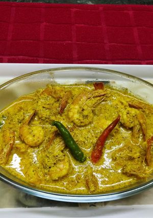 A picture of Chingri Bhapa or Steamed Prawns in Coconut Mustard Paste.