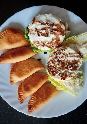 Foto principal de Empanadillas con cogollos con queso de rulo de cabra