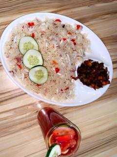 A picture of Coconut rice with kidney sauce.