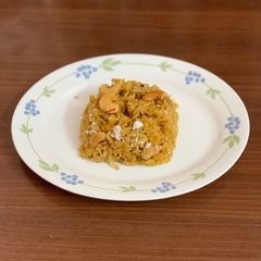 A picture of Narali bhat/sweet coconut rice.