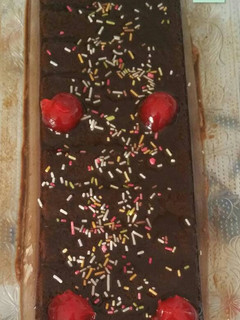 Una foto de Un flan de chocolate café y caramelo