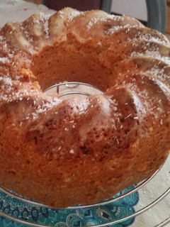 Una foto de Budín de coco y dulce de leche