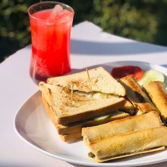 A picture of Cigar roll and club sandwich.