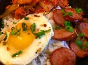A picture of fried pork with kimchi